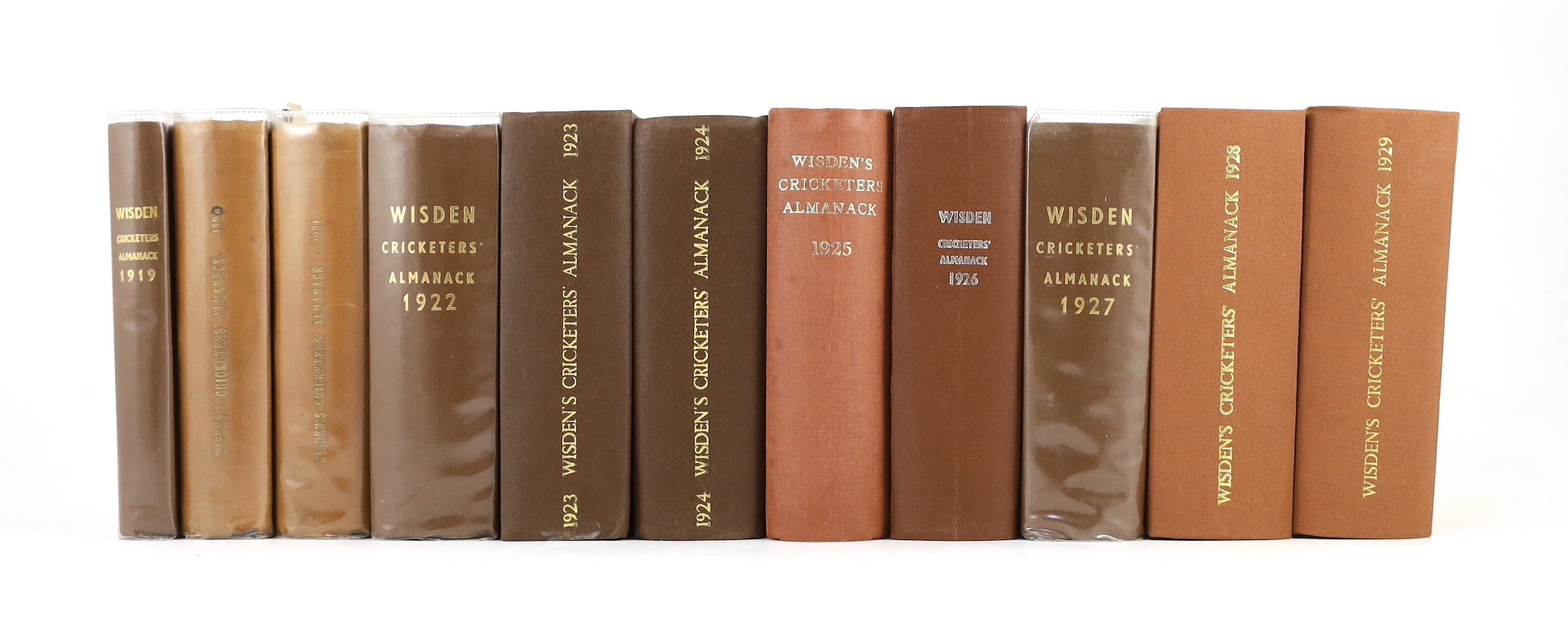 Wisden, John - Cricketers’ Almanack for the years 1919 (56th edition) - 1929 (66th edition), all rebound brown cloth gilt, and retaining original paper wrappers, bar issues of 1920-21, which lack wrappers and early adver